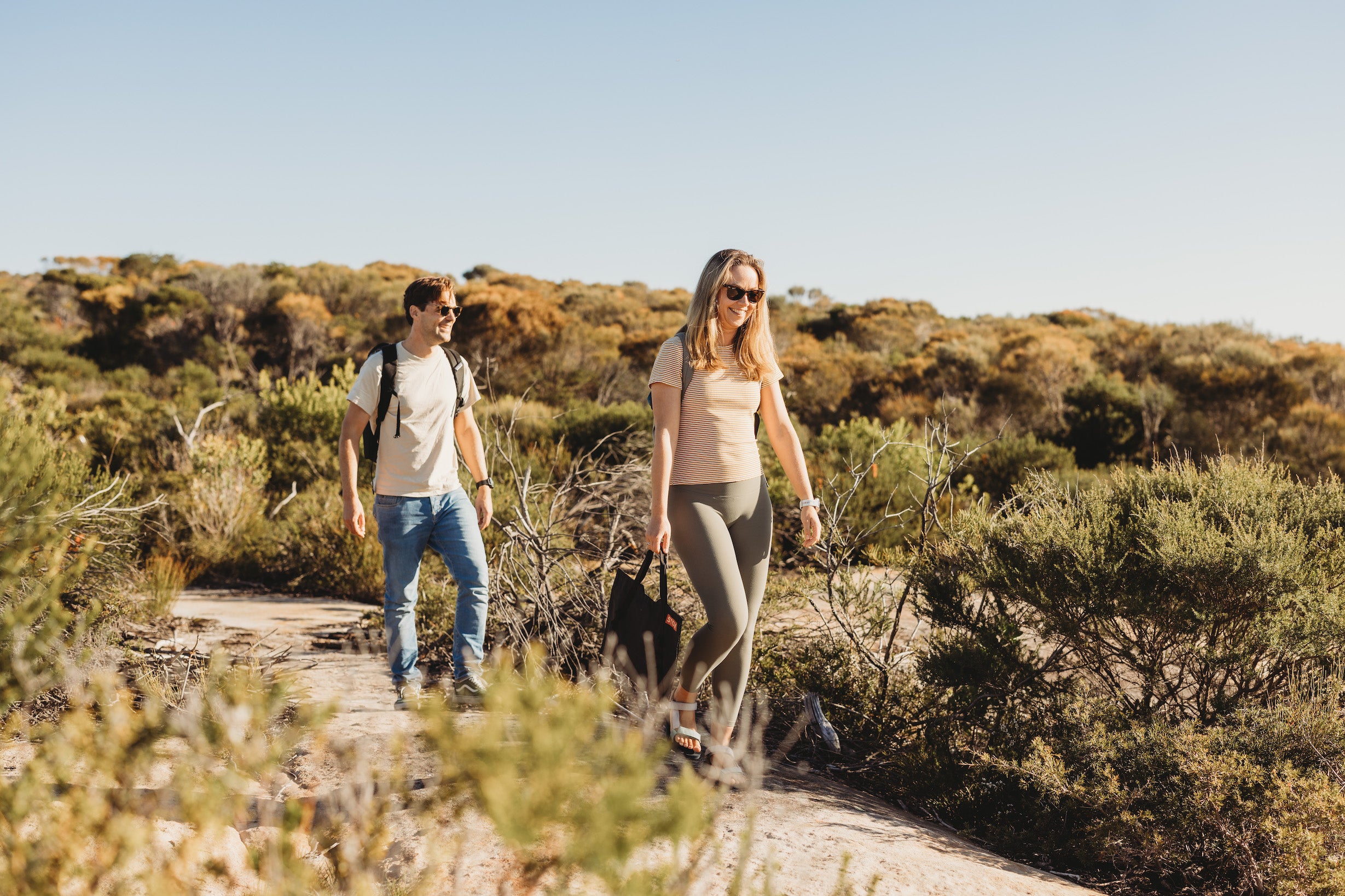 Exploring a NSW camp spot close to the beach while carrying the portable gas BBQ (the STOV BBQ) in its carry bag.