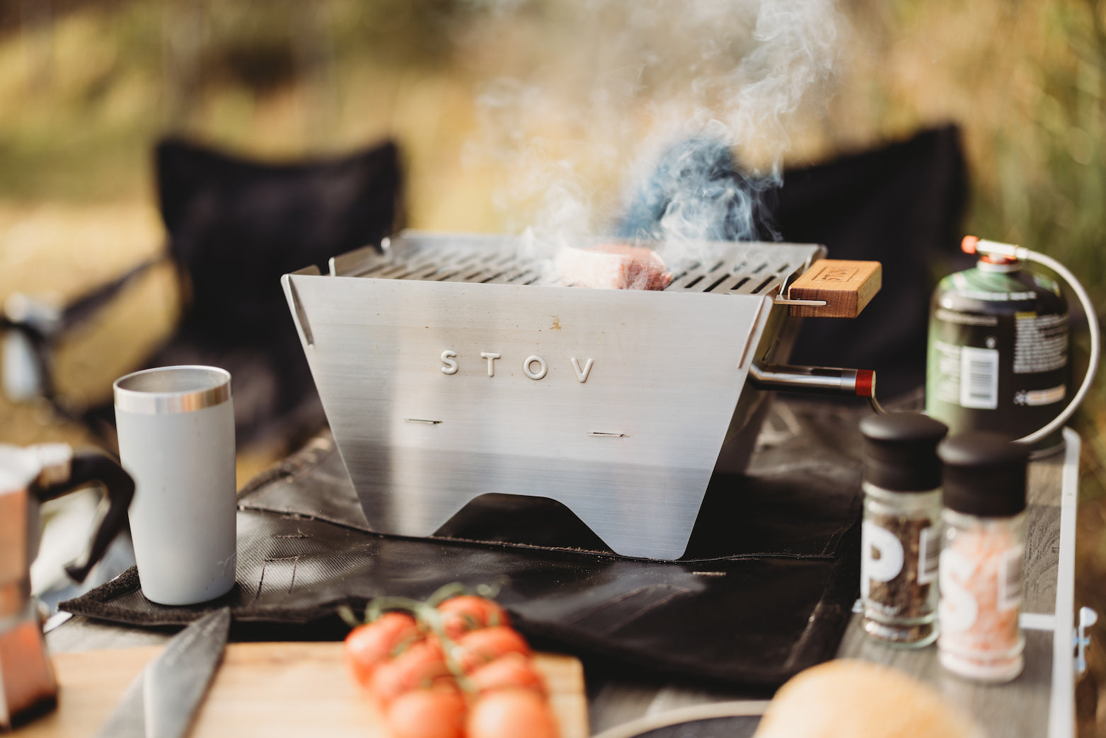 Cooking on the best portable bbq in Australia on the STOV barbecue with a steak