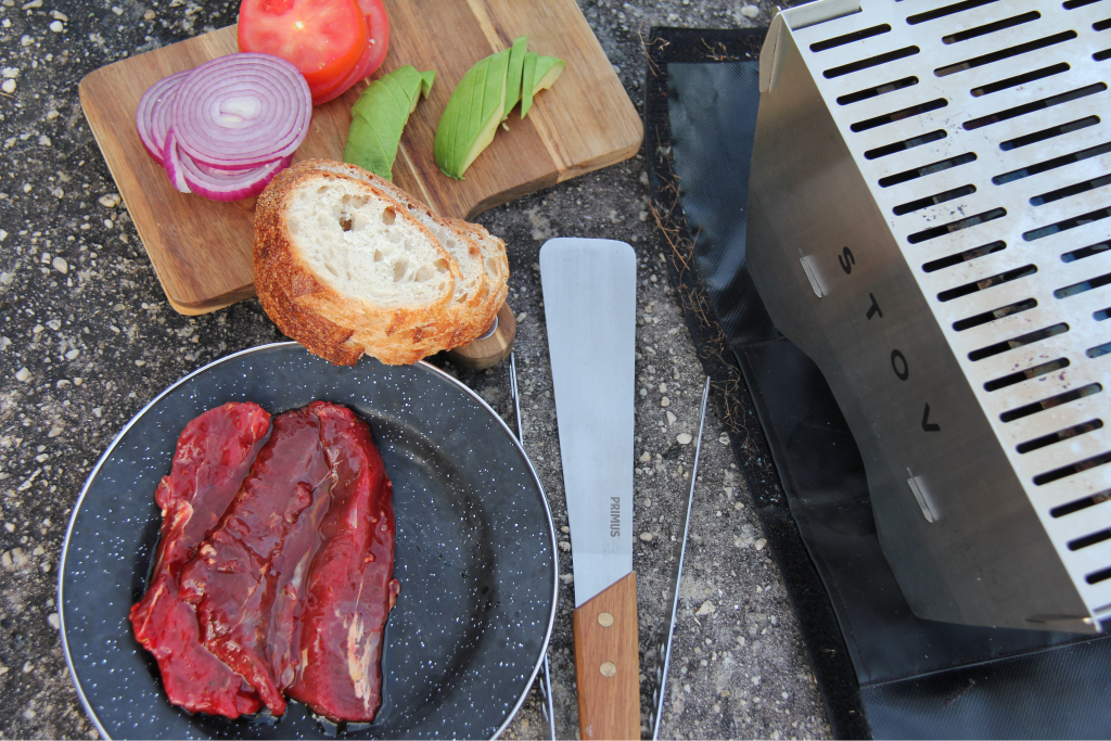 Meat and veggies ready to be cooked on the portable STOV BBQ