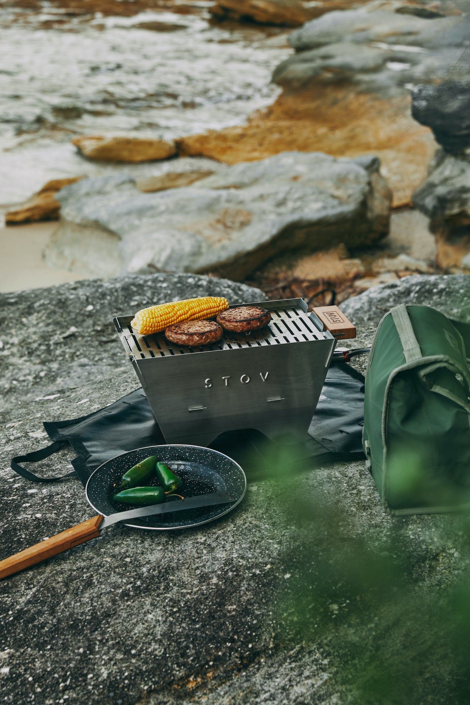 STOV portable gas bbq cooking delicious food while out camping