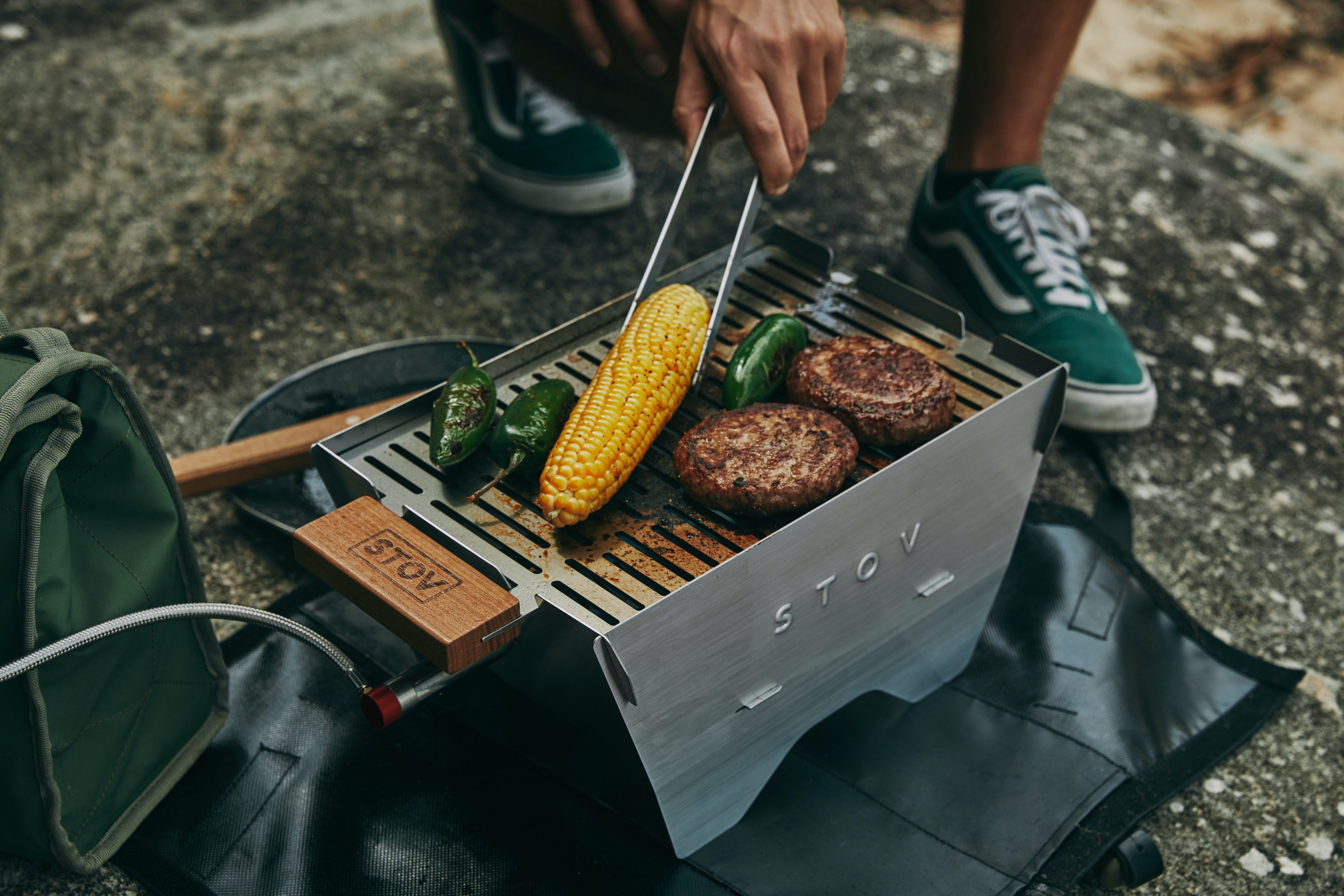 Best portable bbq for camping - the compact STOV gas BBQ set up cooking really good food