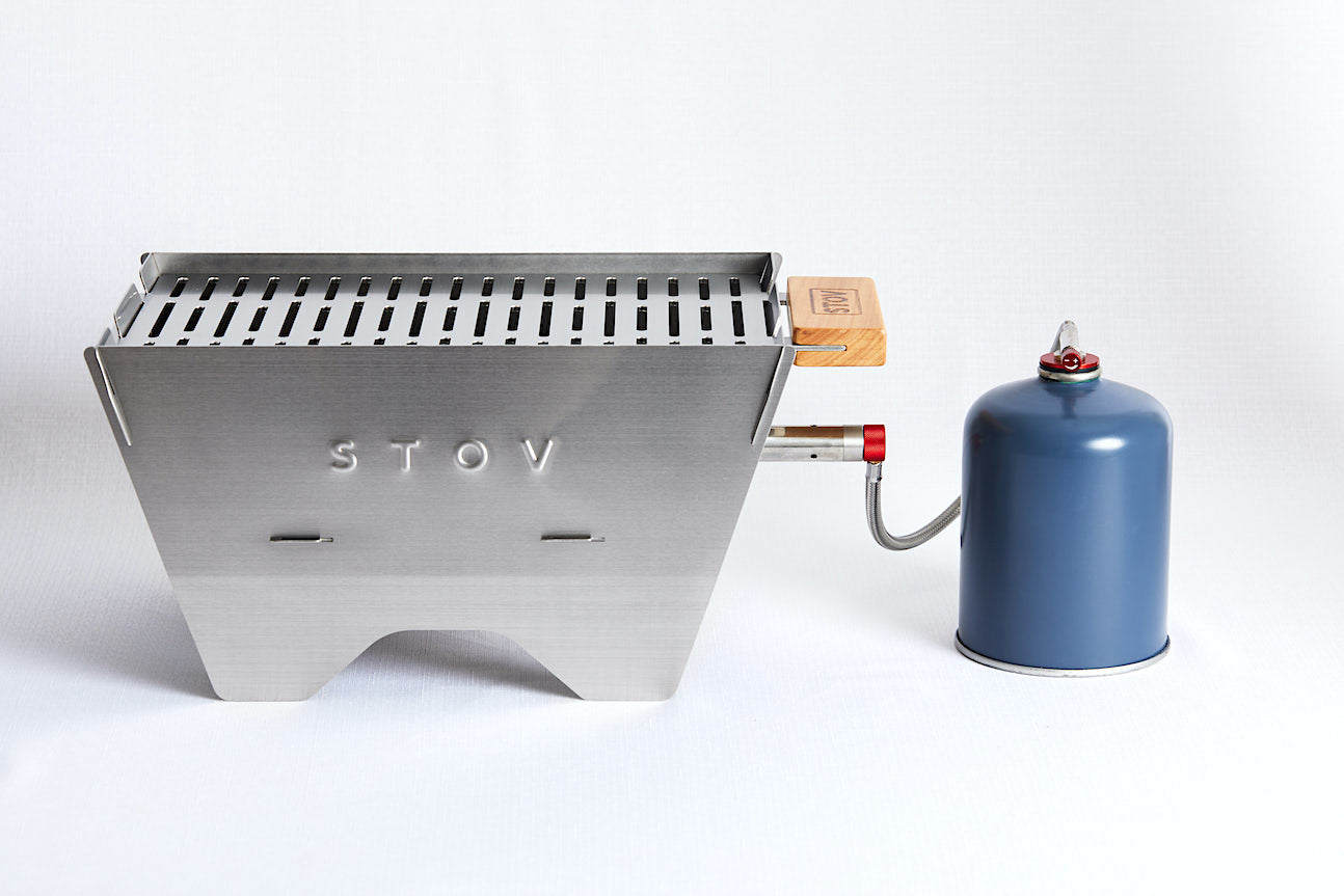STOV Portable Gas BBQ connected to gas bottle