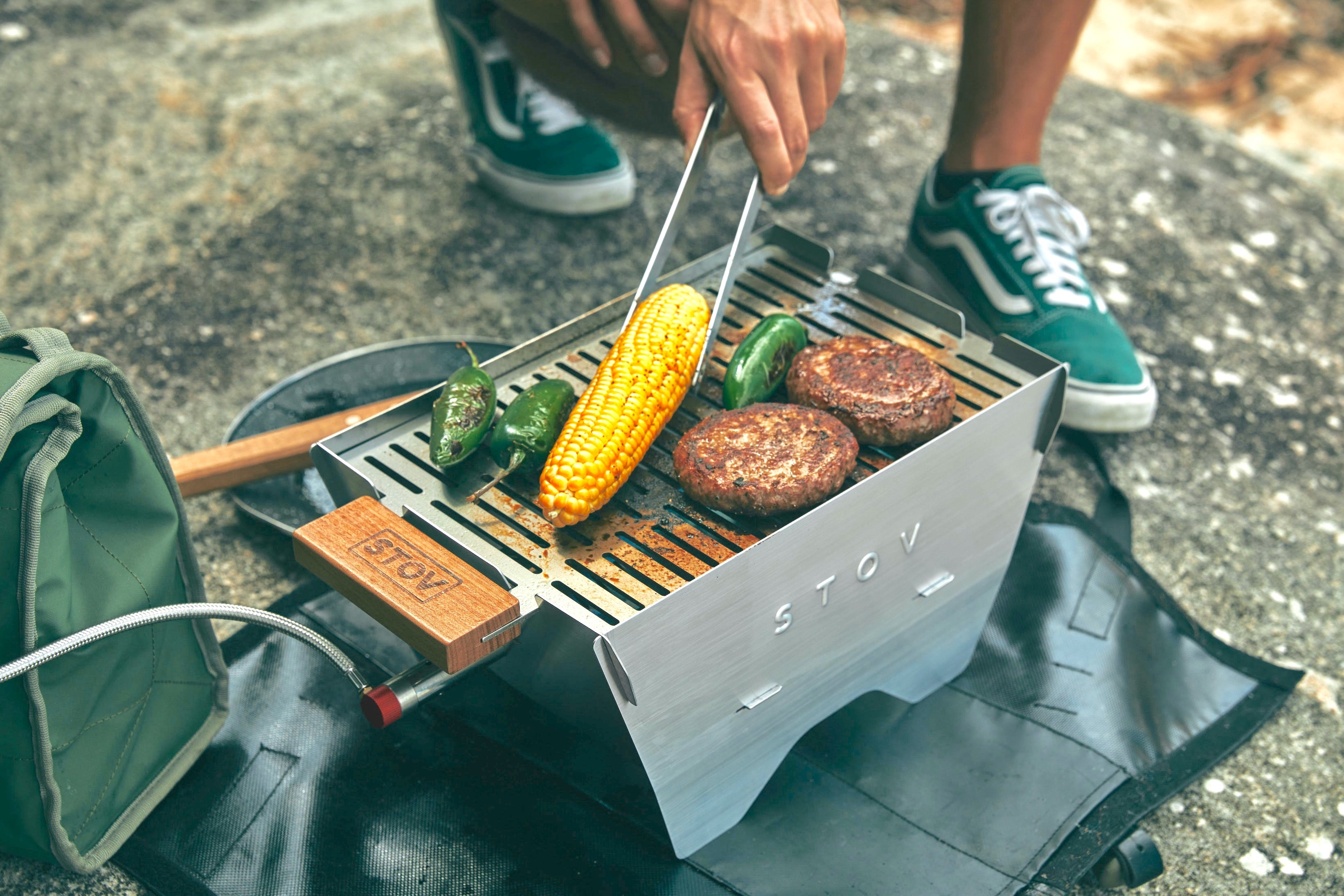 Best portable bbq for camping - the compact STOV gas BBQ set up cooking really good food